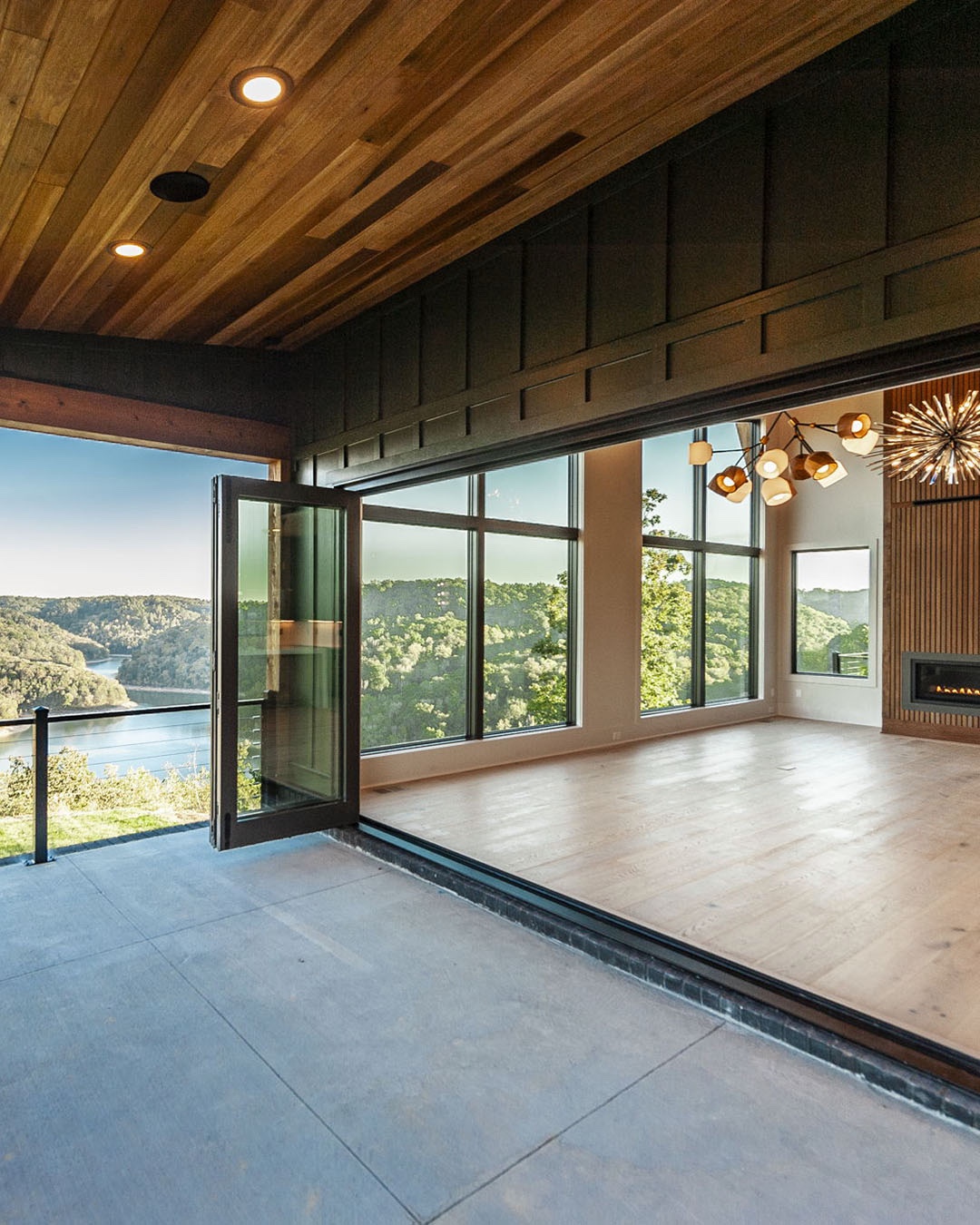 Covered patio and lake view at 199 Deer Path Ct
